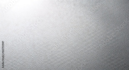 Silver Texture Background. Metallic, embossed surface background with gradient lighting and detailed bumps.