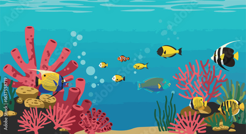 Colorful fishes swim among coral, seaweed, and rocks in the blue ocean water