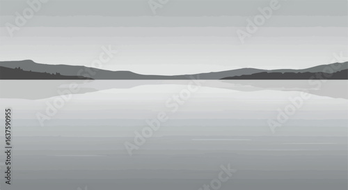 Serene grayscale vista. Distant mountains reflect on a calm, glassy lake. Peace