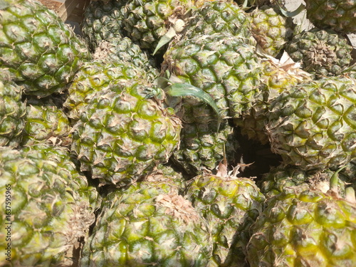 close up of pineapple in a market