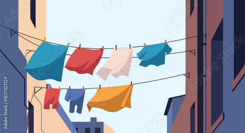 Colorful Laundry Drying on Clotheslines Between Buildings in a Cityscape