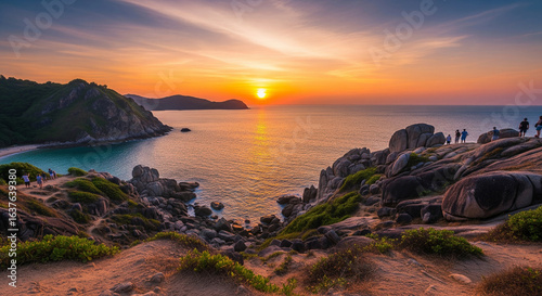 Majestic scenery of Promthep Cape, Phuket, Thailand, at dusk, showcasing the dramatic cliffs and palm trees overlooking the sea.
