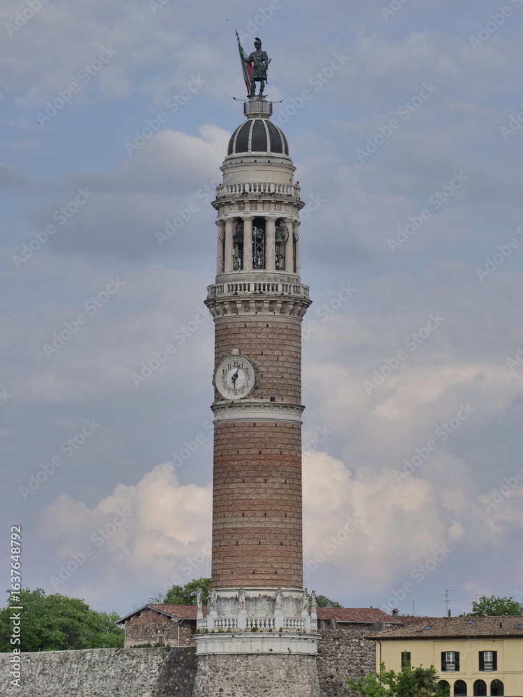 Obraz premium San Fedele clock tower the tallest circular bell tower in Europe, Palazzolo sull'Oglio, Italy.