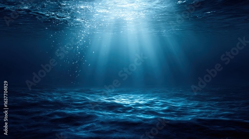 Underwater Sunlight Rays Illuminating the Ocean Floor, Creating a Serene and Mysterious Marine Environment