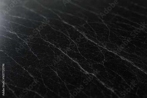 Elegant Black Marble Texture Background with Subtle Veins, Perfect for Luxury Designs and High-End Presentations