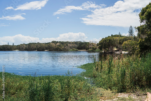 Lake Ainsworth, located in Lennox Head, New South Wales, Australia, is a popular tea-tree lake known for its dark, tannin-stained waters and health-giving properties.