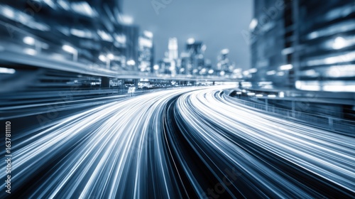 Blurred Motion of Car Headlights on a Cityscape at Night, Representing Speed and Connectivity