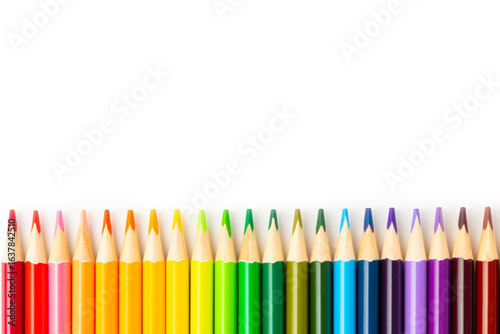 Colored pencils isolated on white background. Equipment for coloring. Stationery for creativity.Back to school. Flatlay. Children's Creativity and Education. Rainbow.