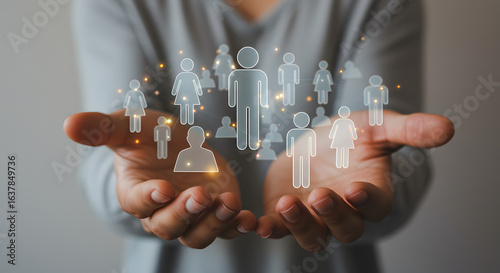 Human resources concept: Hands holding diverse figures in network illustration