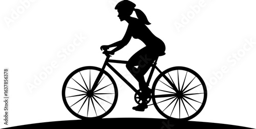 Silhouette of a woman riding a bicycle outdoors promoting healthy lifestyle and ecological transportation choices with protective headgear