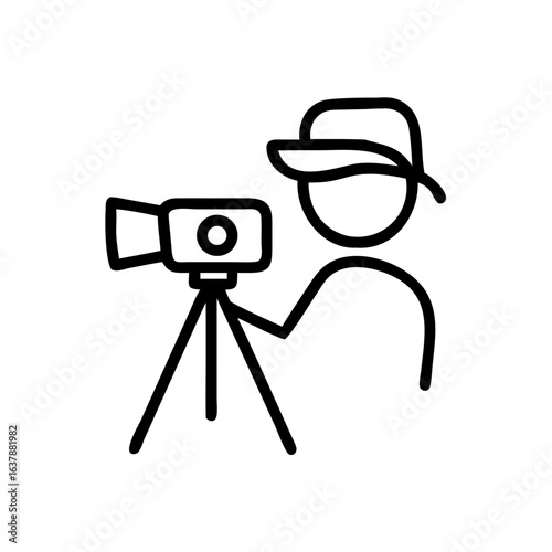 Photographer using camera on tripod in outdoor setting  