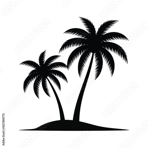 Two black palm trees silhouetted on a small island