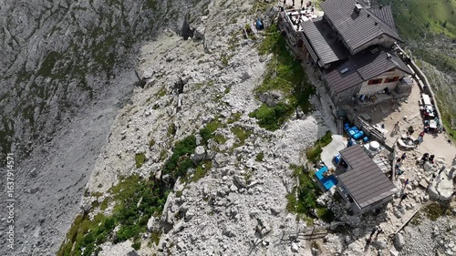 Aerial drone footage of the Rifugio Nuvolau Cabin and mountain surroundings, in Italy.