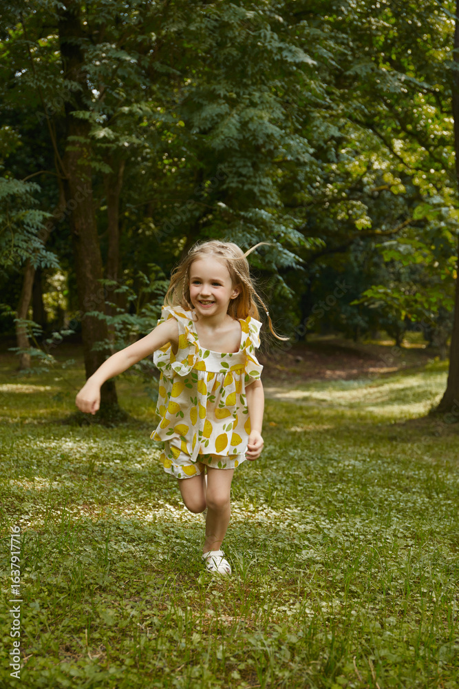 Child playing joyfully in a lush green park. Child playing joyfully in a lush green park.