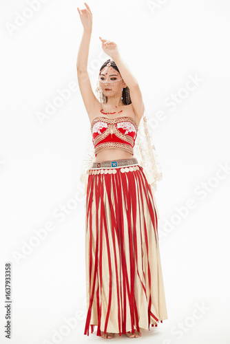 Belly dancers dressed in traditional Indian costumes