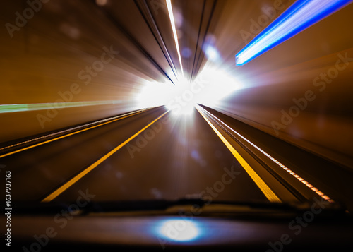 Driving through a tunnel, long exposure, blur, light trails.
german autobahn romantic, blurry.
on the road in germany, on german autobahn tunnel, warp tunnel, abstract, artfuly