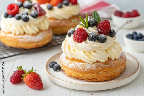 Traditional Italian dessert zeppole cake with Chantilly cream and fresh berries