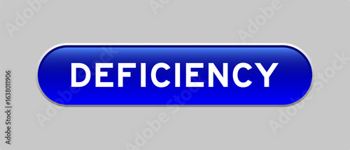 Blue color capsule shape button with word deficiency on gray background