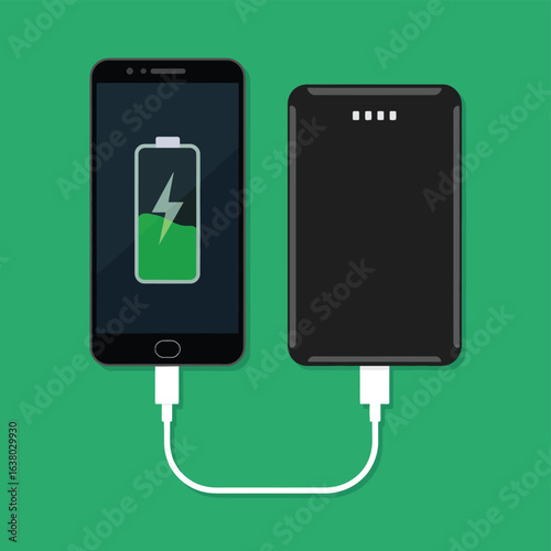 Smartphone charging with a portable power bank on a green background