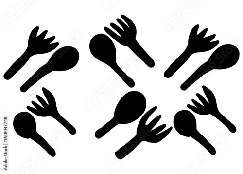 A set of handprints and a set of silverware silhouettes