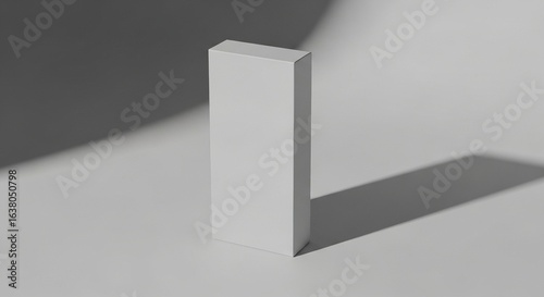 Wallpaper Mural A blank white rectangular product box stands upright on a clean light surface with sharp, minimalist shadows, ideal for branding or packaging design mockups. Torontodigital.ca