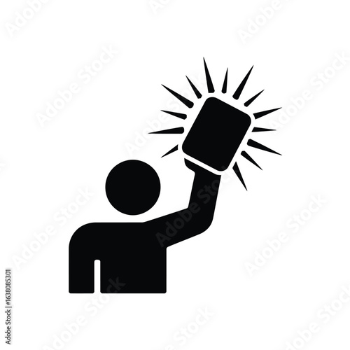 Person holding up a brightly shining object