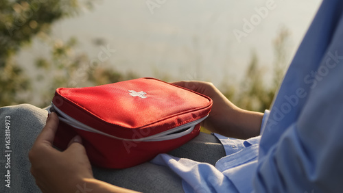 First aid kit. Pond and first aid kit. Pond. High quality photo.