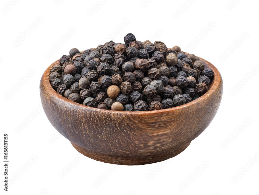 Black pepper in a wooden bowl for culinary use Black pepper in a wooden bowl for culinary use