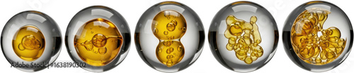 Close up abstract view of amber liquid inside clear spheres showing division and clustering isolate science