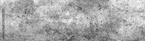 Gray textured surface with speckled patterns