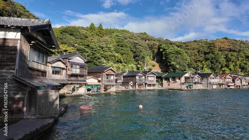 Beautiful late afternoon sight in Ine Bay, with the typical Funaya boat houses. Kyoto, Japan.
