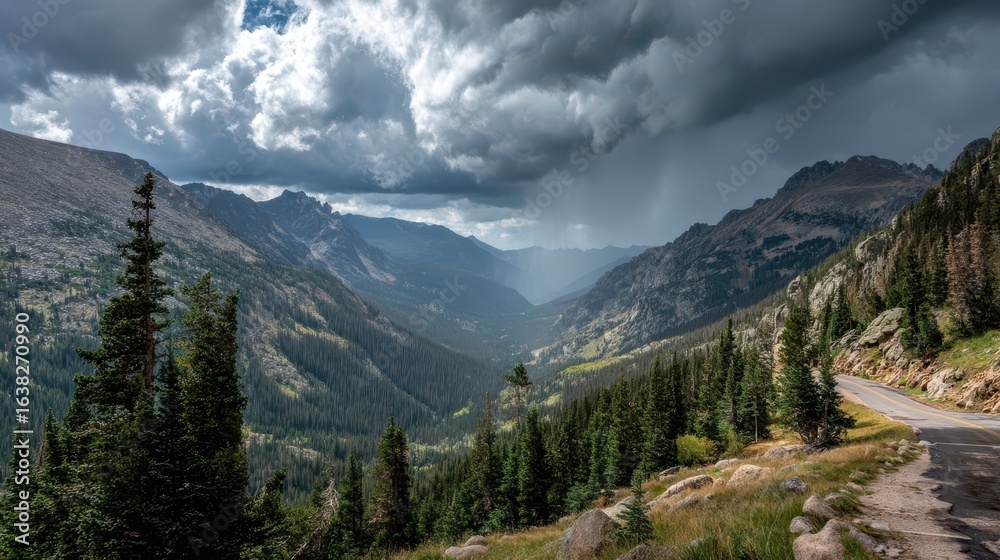 Fototapeta premium Dramatic Mountain Landscape Under Moody Clouds with Scenic View