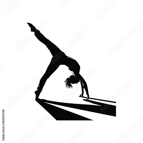Silhouette of a dancer in mid leap