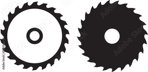 Two circular saw blades one white one black silhouette