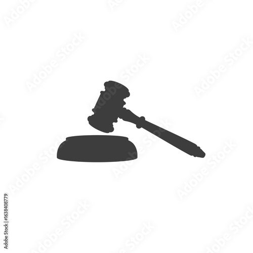 Dark silhouette of a judge s gavel and sounding block