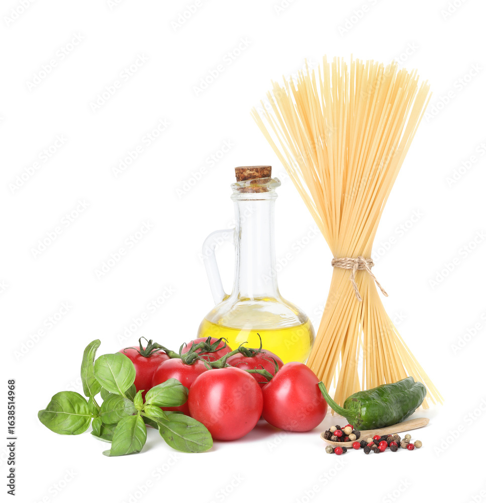 Fototapeta premium Raw spaghetti pasta and different ingredients isolated on white