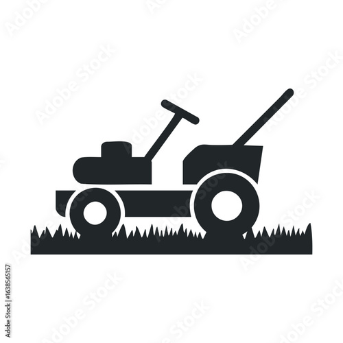 Silhouette of a lawn mower on grass: icon for gardening and landscaping tools