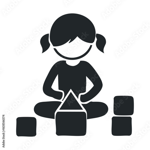 Silhouette of young caucasian female child playing with building blocks