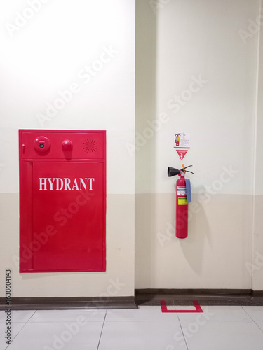 Wallpaper Mural Fire hydrant box and extinguisher in a hospital corridor, essential fire safety equipment for emergency prevention and protection Torontodigital.ca
