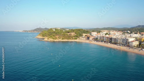 Wallpaper Mural Aerial 4K video from drone to lloret de mar city and beach on a sunny summer morning in costa brava, spain Torontodigital.ca