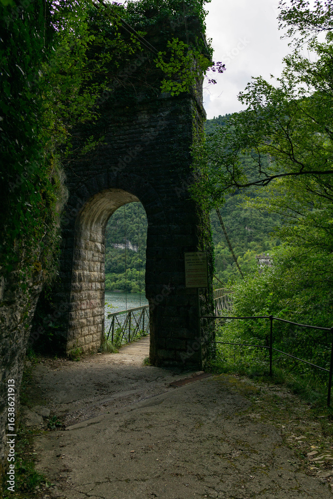 Fototapeta premium Lago del Corlo with Ponte della Vittoria Bridge in Belluno ,Italy