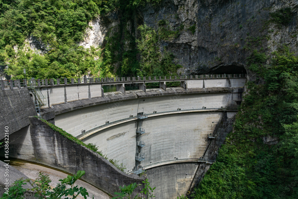 Fototapeta premium Corlo Dam on Lago del Corlo, Belluno, Italy