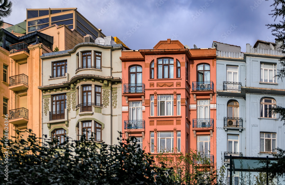 Fototapeta premium Buildings with ornate baroque facades near Taksim Square in Istanbul, Turkey
