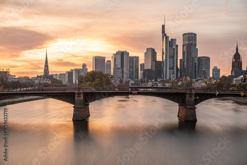 Wallpaper Mural Frankfurt skyline reflecting in main river at sunset with bridge Torontodigital.ca