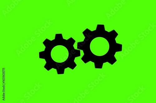Black Gears Rotating Seamlessly on a Vibrant Green Screen Background, Perfect for Technical Animations and Motion Graphics.
