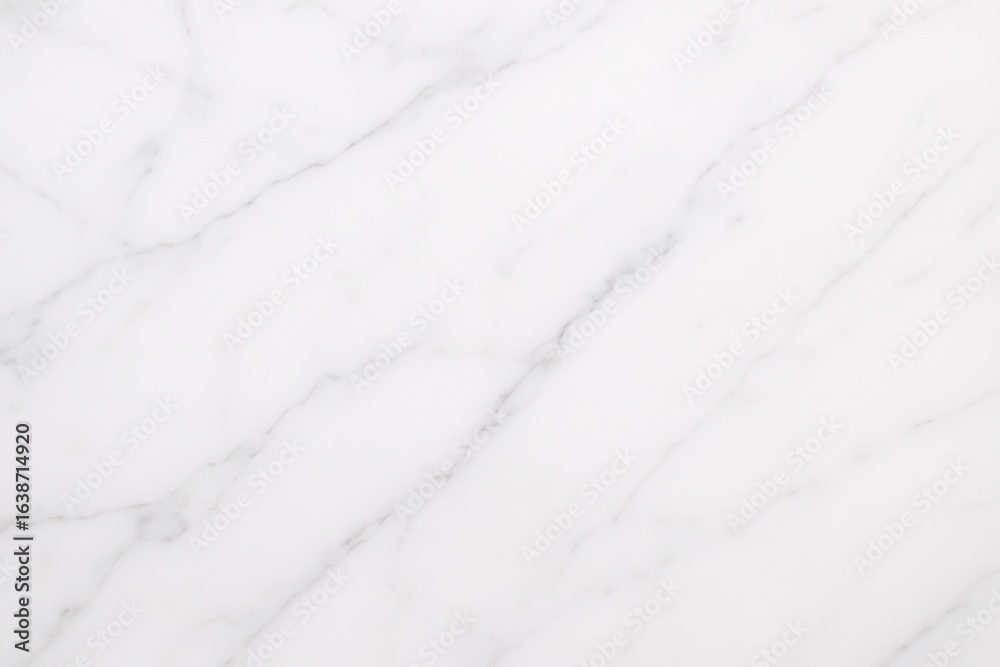 Obraz premium Pristine white marble surface with soft natural lighting creating elegant product photography backdrop for luxury cosmetics and jewelry marketing