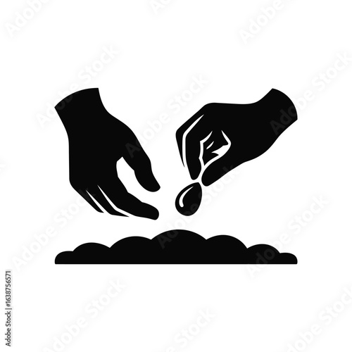 Hands planting a seed in fertile soil icon silhouette