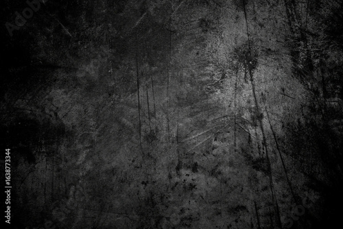 A dark grunge background. Rough walls.