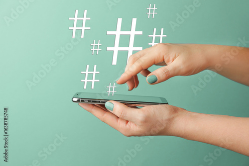 Female hands with modern mo...