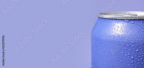 Can of soda on purple backg...
